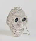 Clutch glamuroso de calavera con pedrería: bolso llamativo, espeluznante y chic