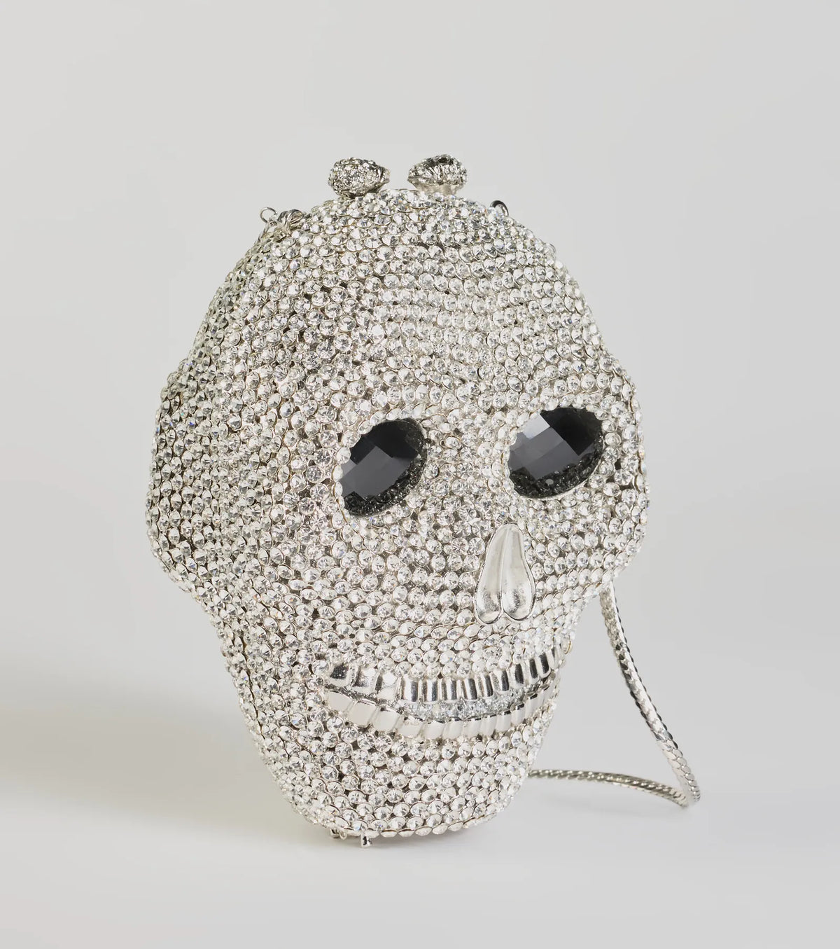 Clutch glamuroso de calavera con pedrería: bolso llamativo, espeluznante y chic