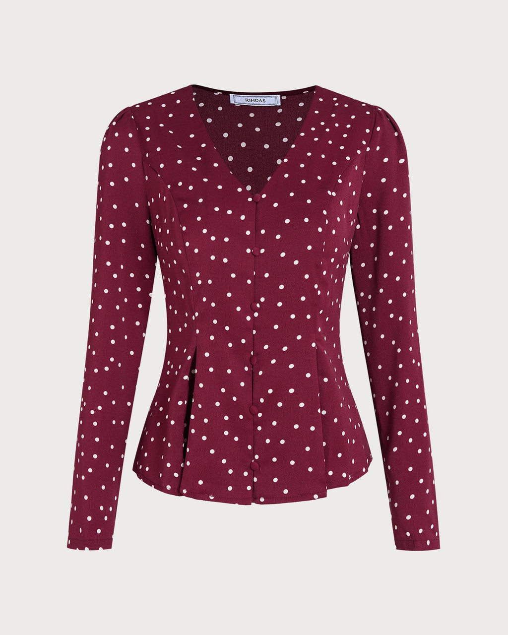 Blusa de lunares con cuello en V