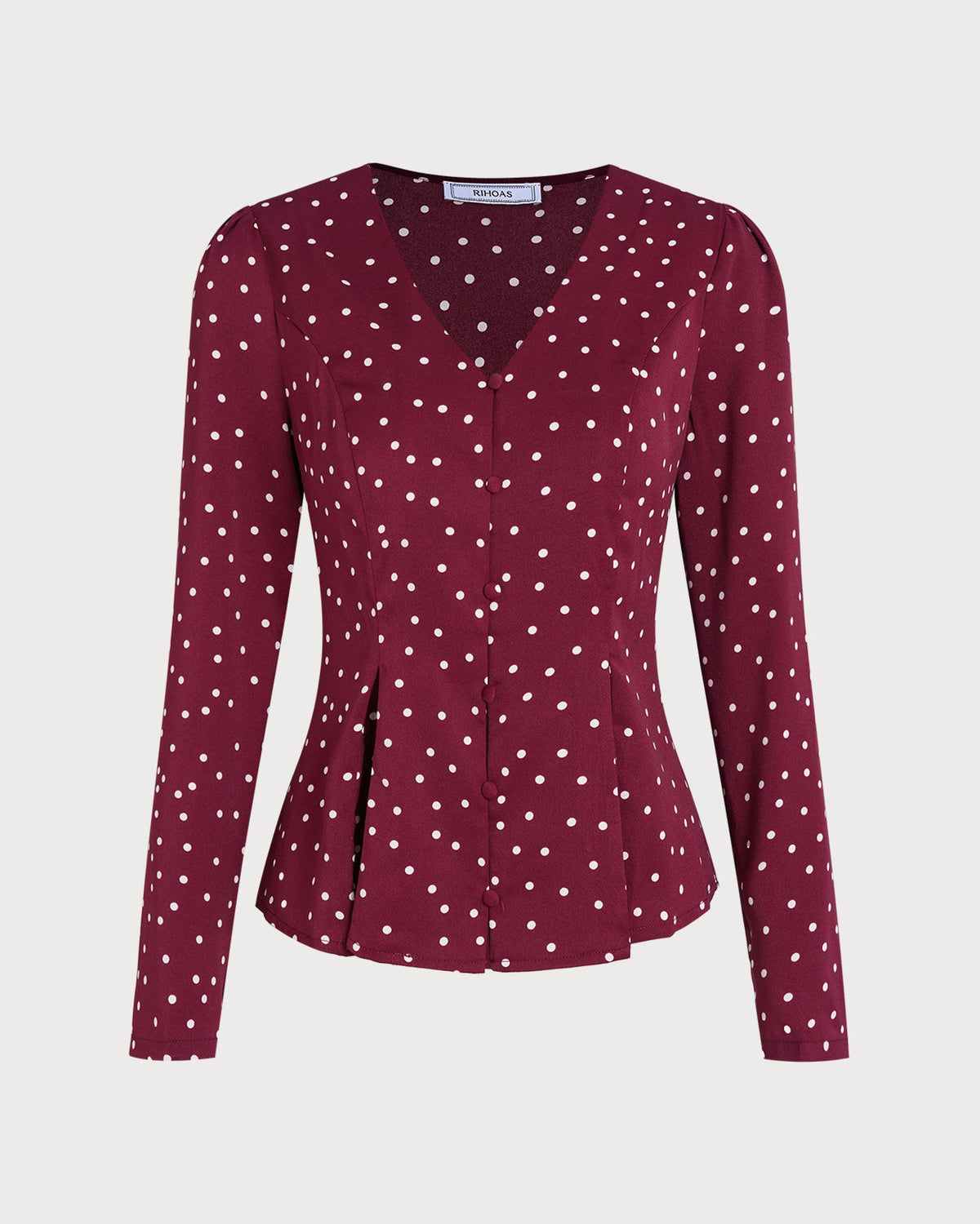 Blusa de lunares con cuello en V