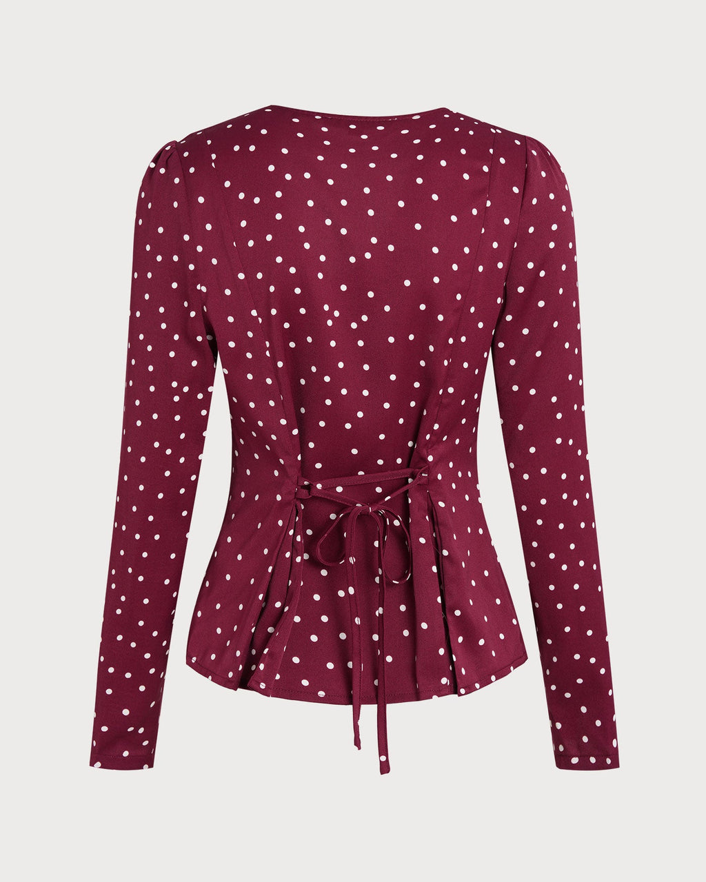 Blusa de lunares con cuello en V