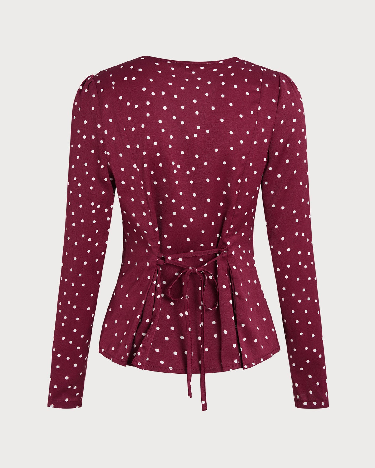 Blusa de lunares con cuello en V