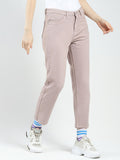 Jeans de mezclilla ajustados de color óxido para mujer