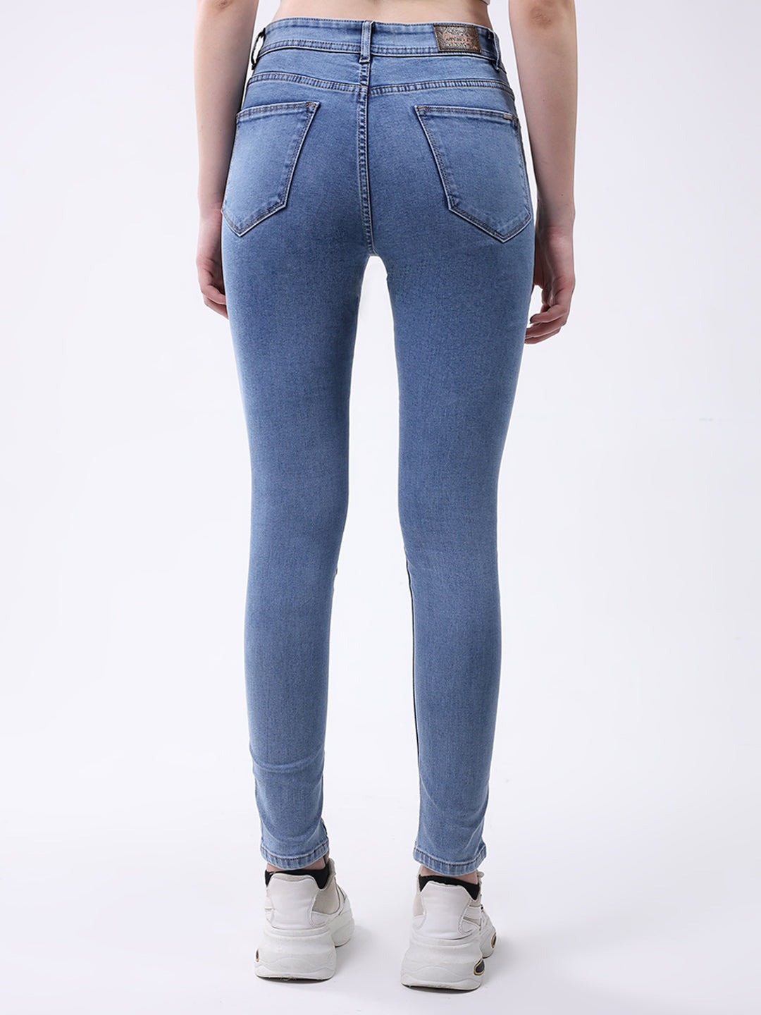 Jeans de mezclilla azules lisos de corte entallado para mujer