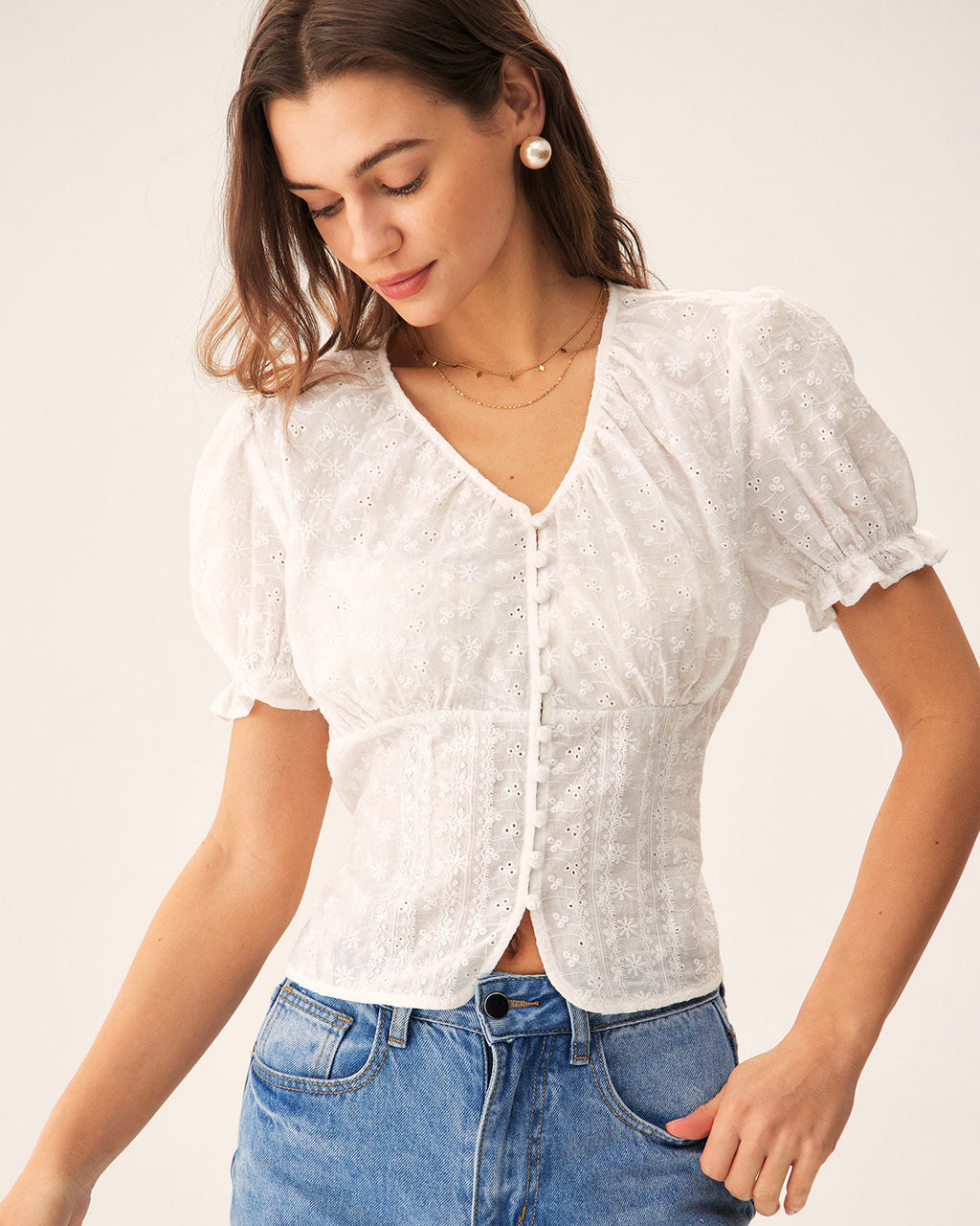 Blusa blanca floral con mangas