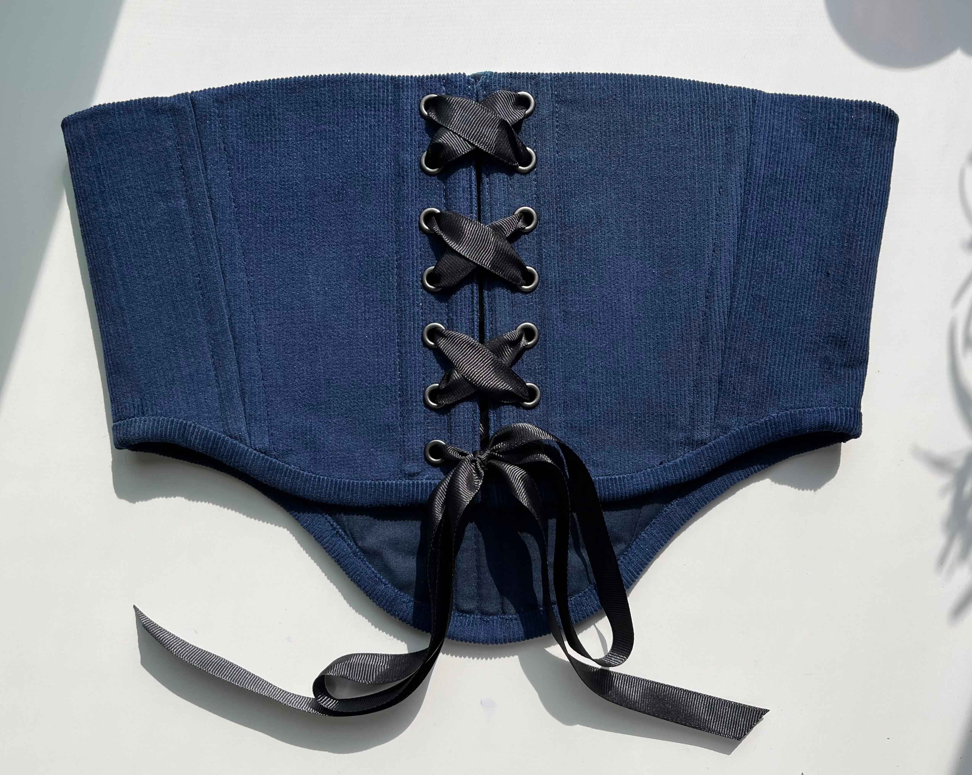 Cinturón azul ramillete