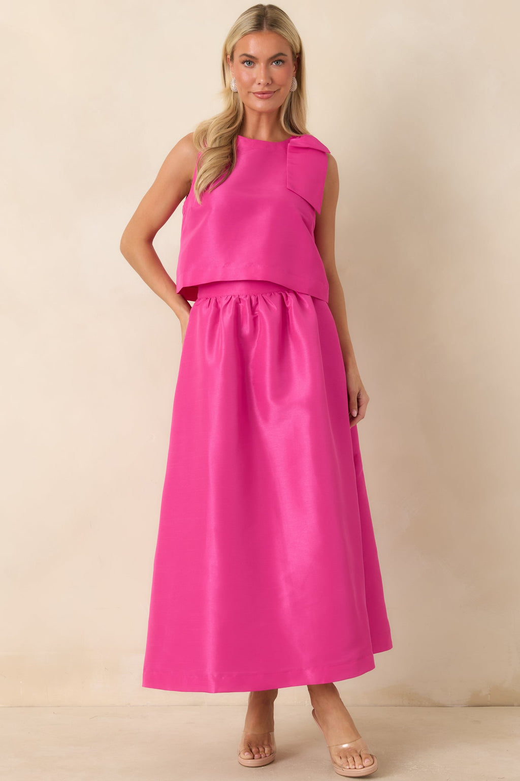 Camisa fucsia con detalle de lazo