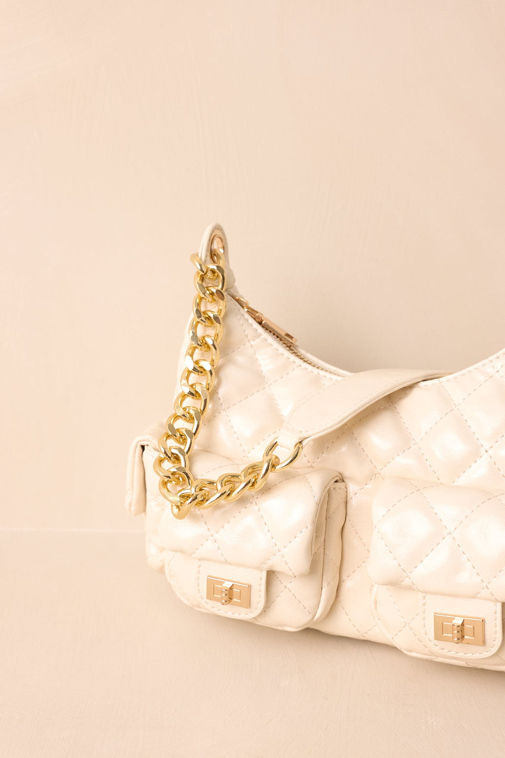 Bolso elegante de piel acolchada color marfil