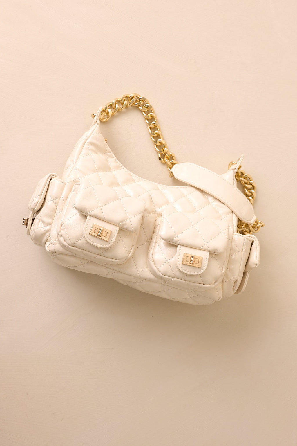 Bolso elegante de piel acolchada color marfil