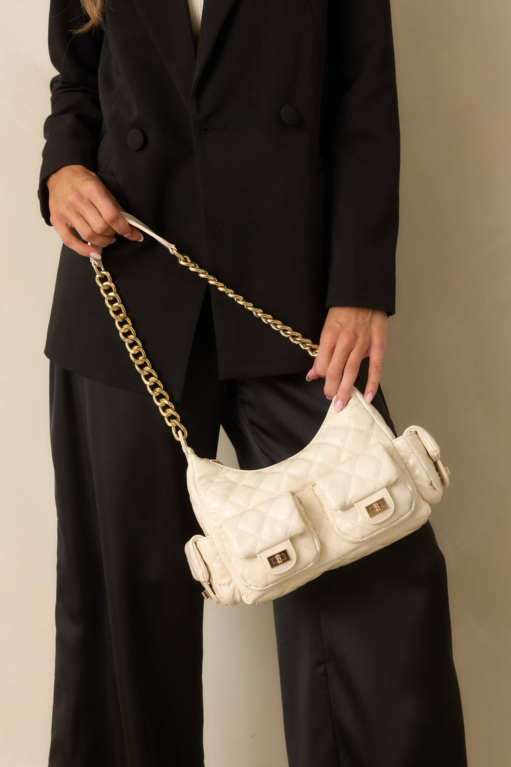 Bolso elegante de piel acolchada color marfil