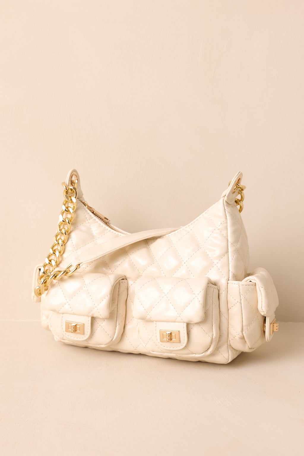 Bolso elegante de piel acolchada color marfil