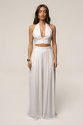 Pantalones blancos plisados elegantes