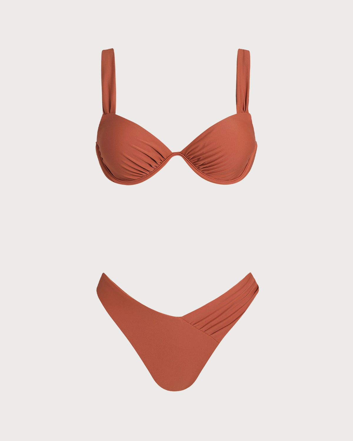 Conjunto de bikini liso color rojo ladrillo con aros, soporte favorecedor y estilo