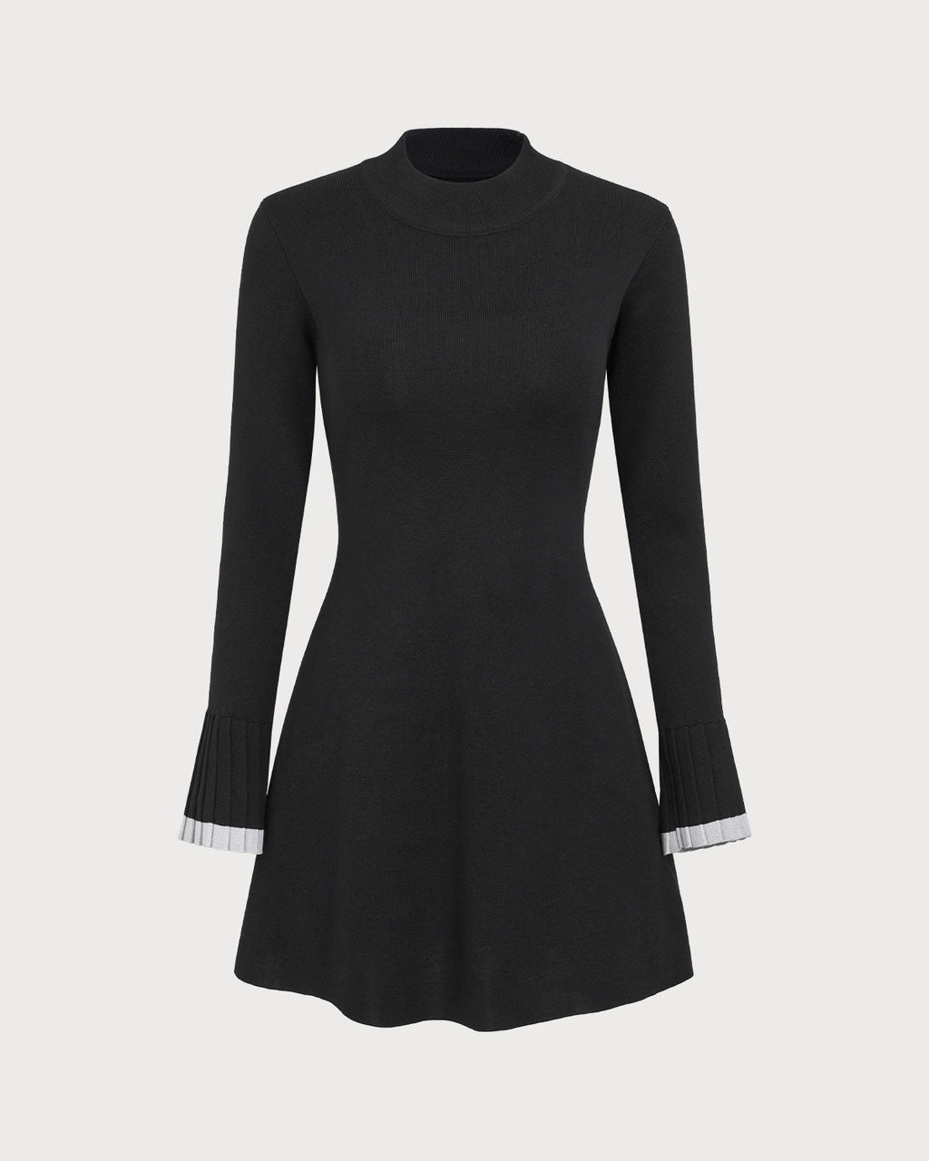 Vestido mini de suéter negro de manga larga en contraste