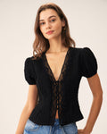 Blusa negra jacquard con encaje