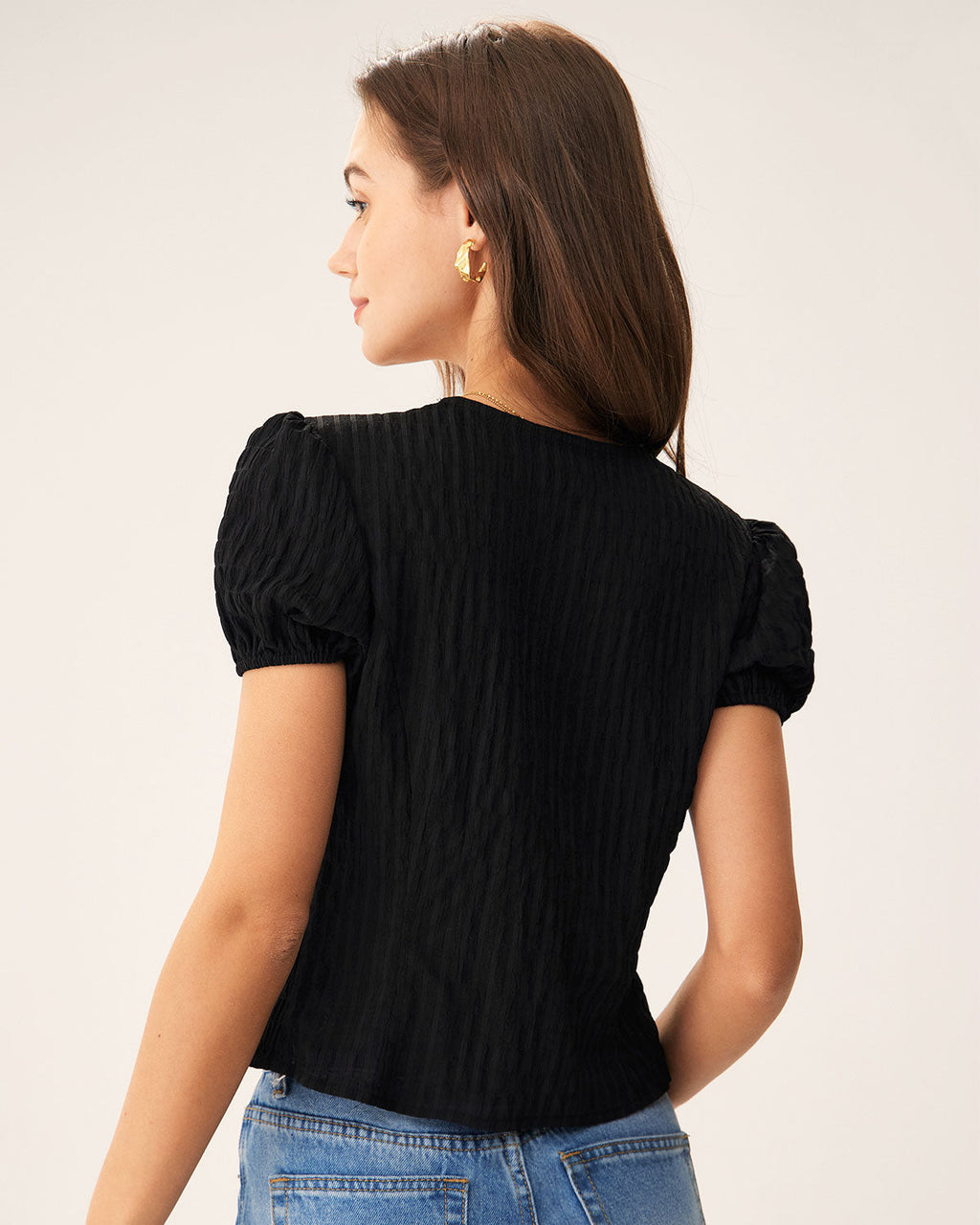 Blusa negra jacquard con encaje