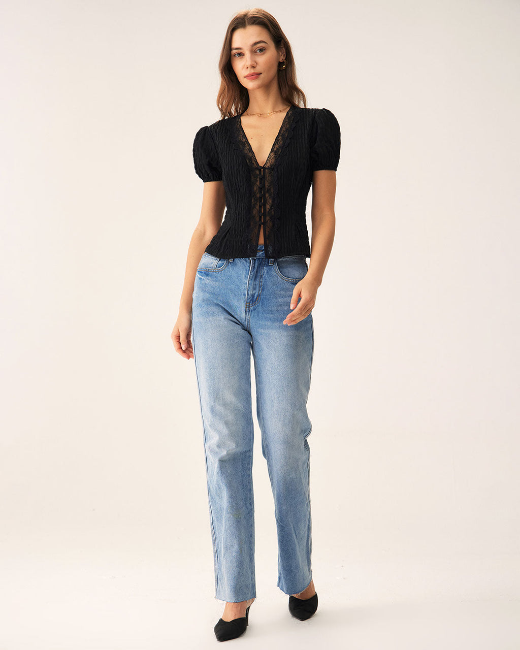 Blusa negra jacquard con encaje
