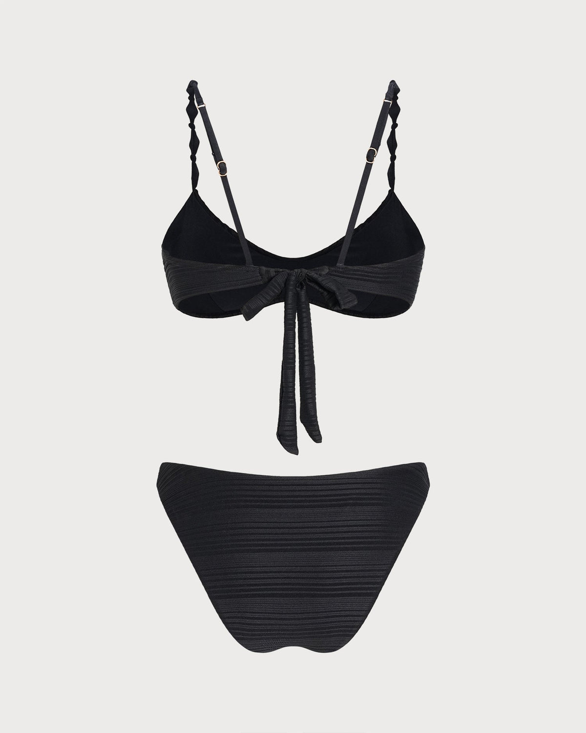 Conjunto de bikini negro con textura y cintura natural