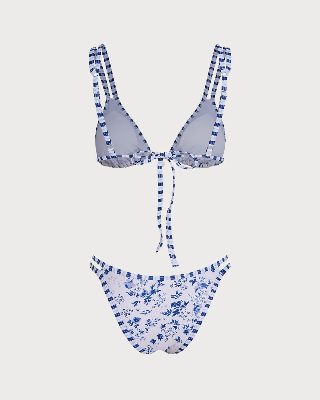 Elegante conjunto de bikini triangular blanco con estampado floral y cordones