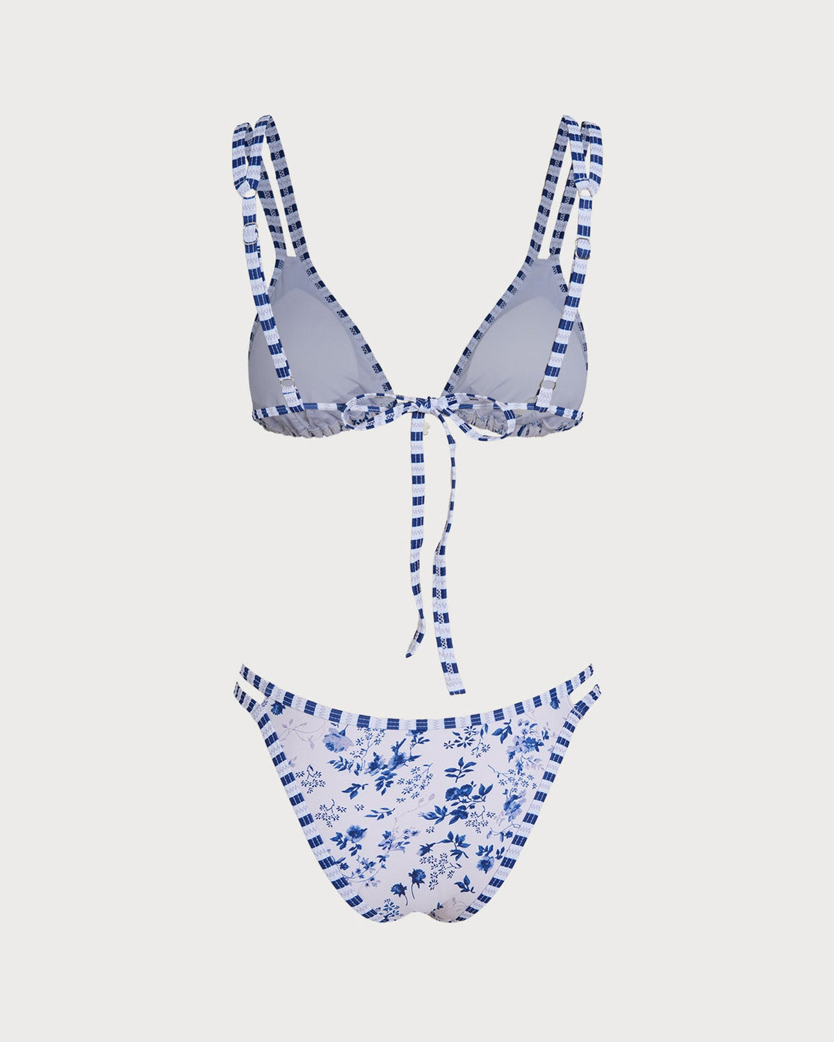 Elegante conjunto de bikini triangular blanco con estampado floral y cordones