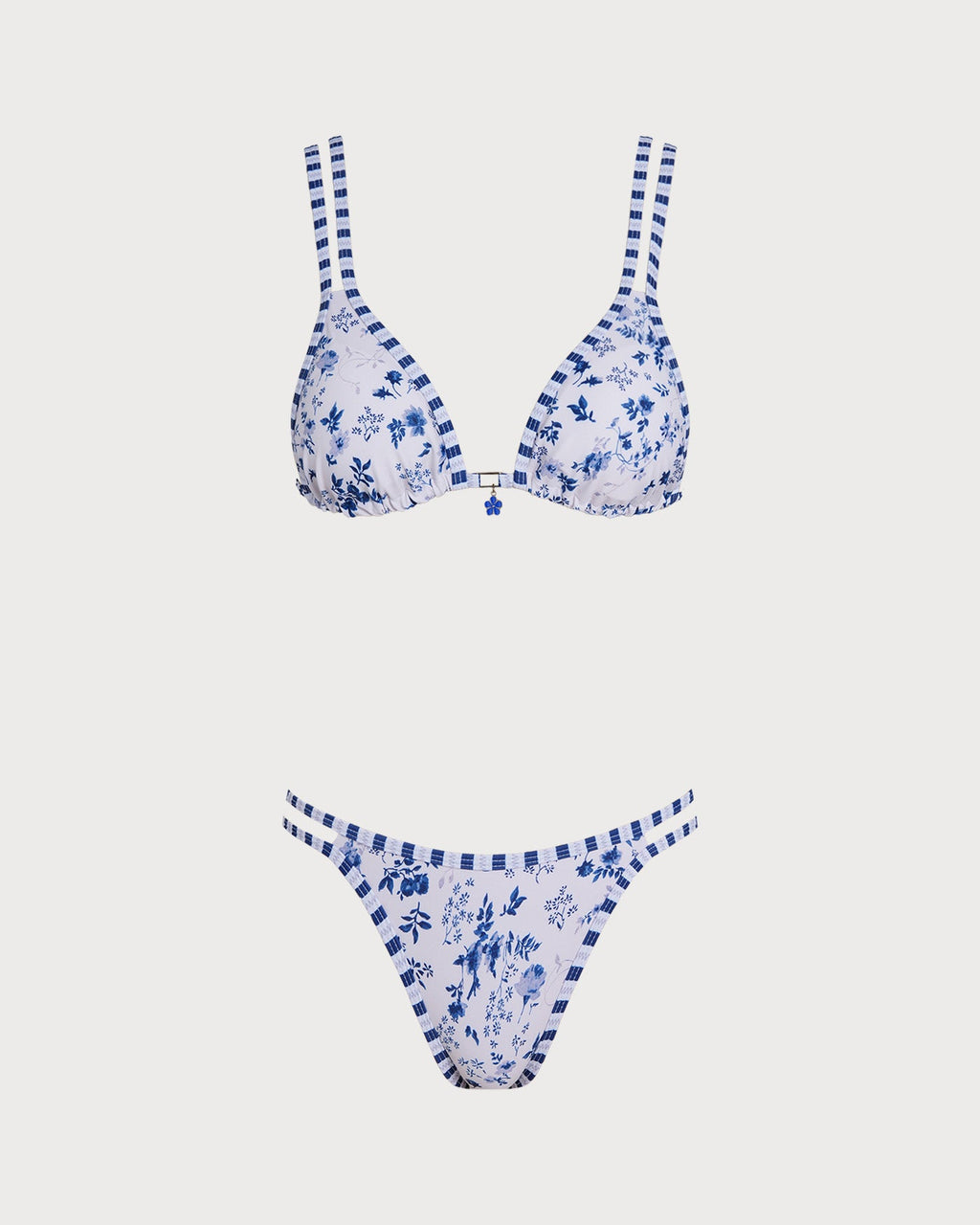 Elegante conjunto de bikini triangular blanco con estampado floral y cordones
