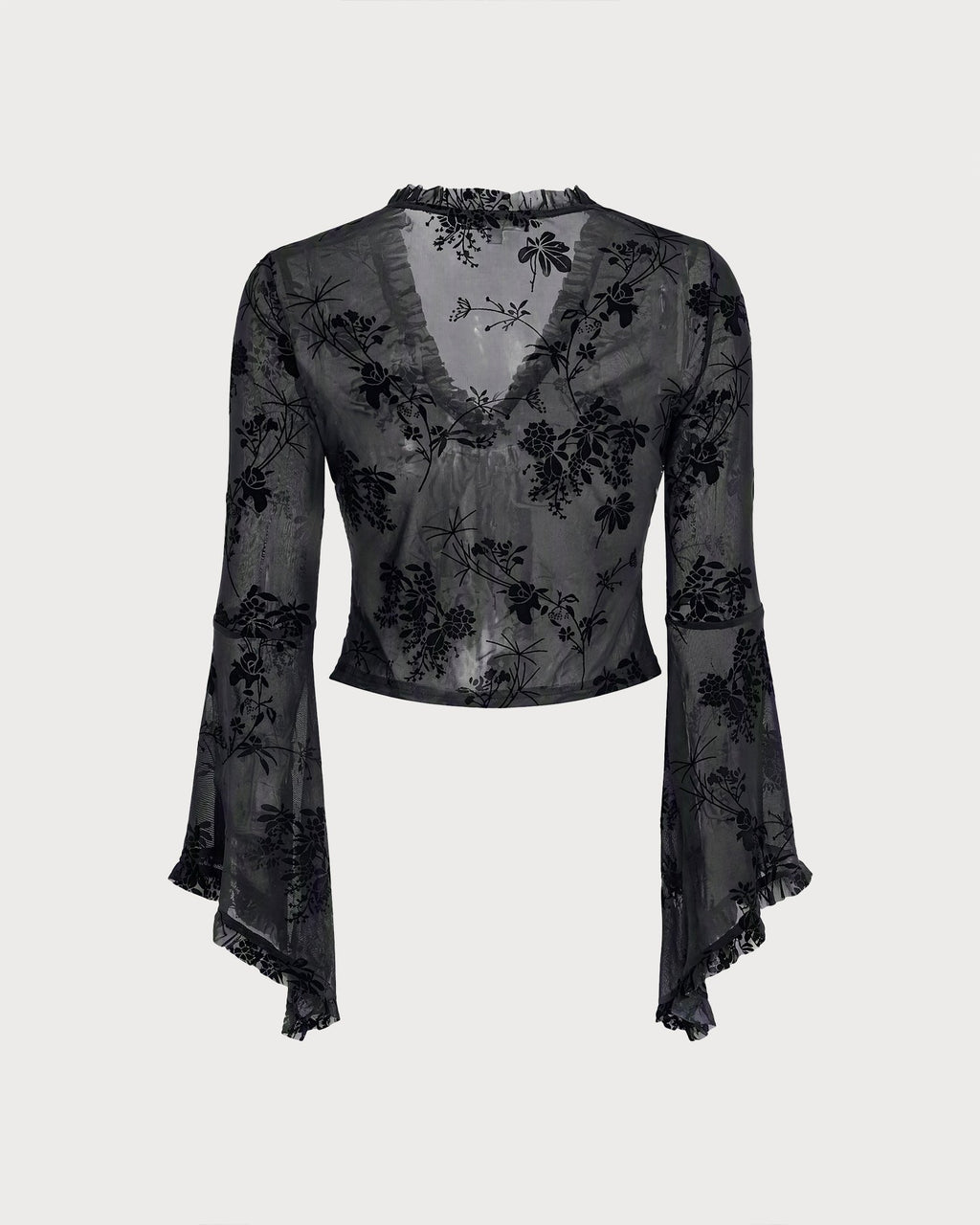 Blusa floral negra elegante con detalles de volantes y mangas acampanadas