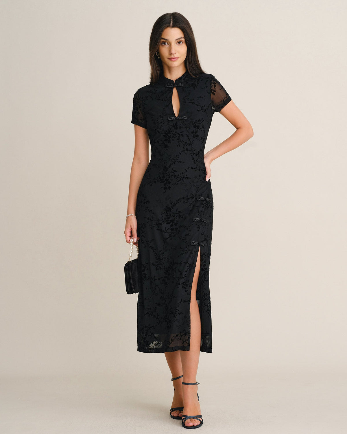 Vestido elegante negro de malla floral
