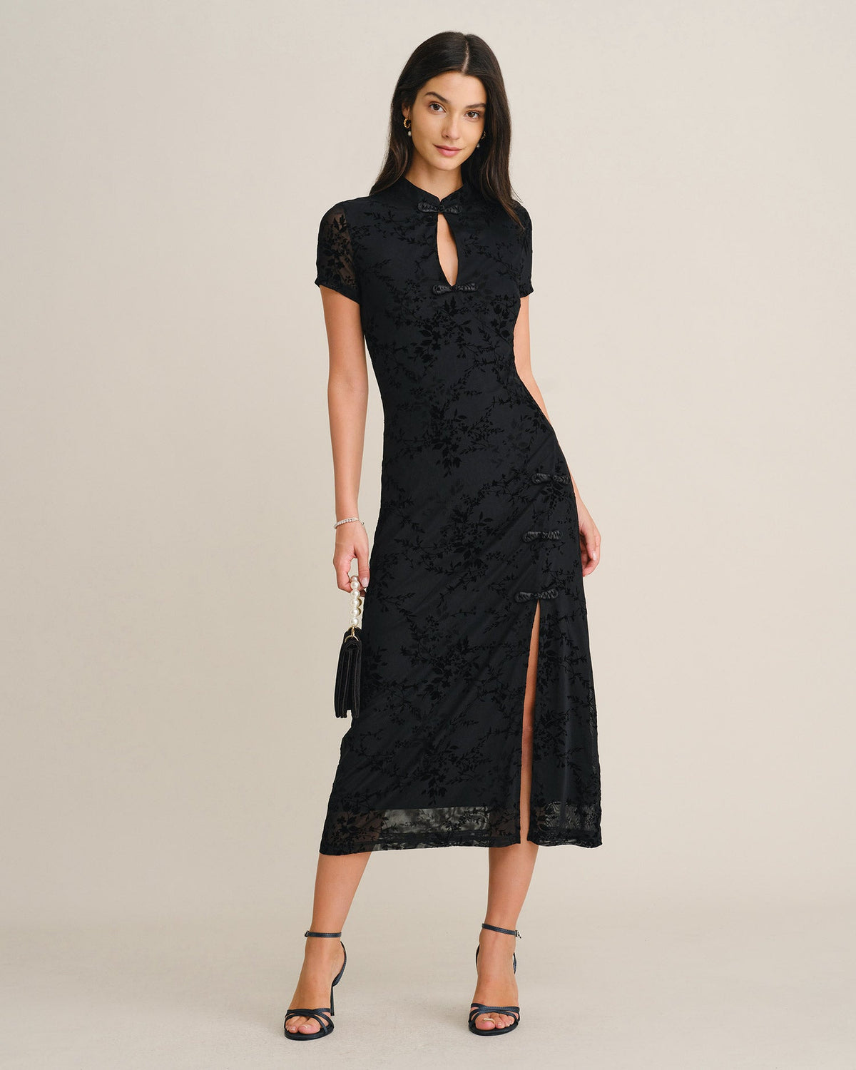 Vestido elegante negro de malla floral