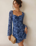 Vestido mini de malla floral con escote en V