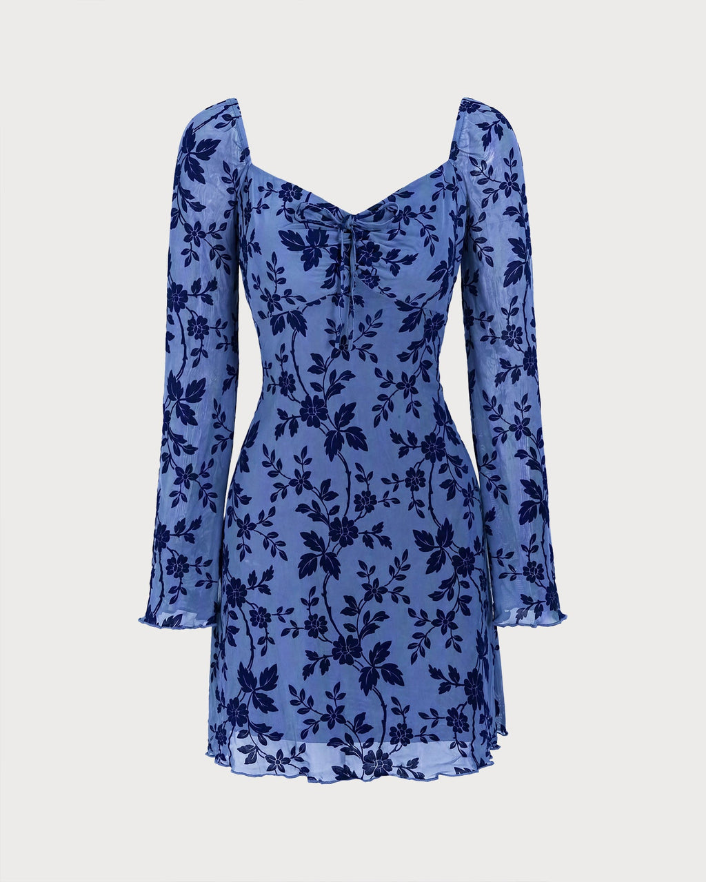 Vestido mini de malla floral con escote en V