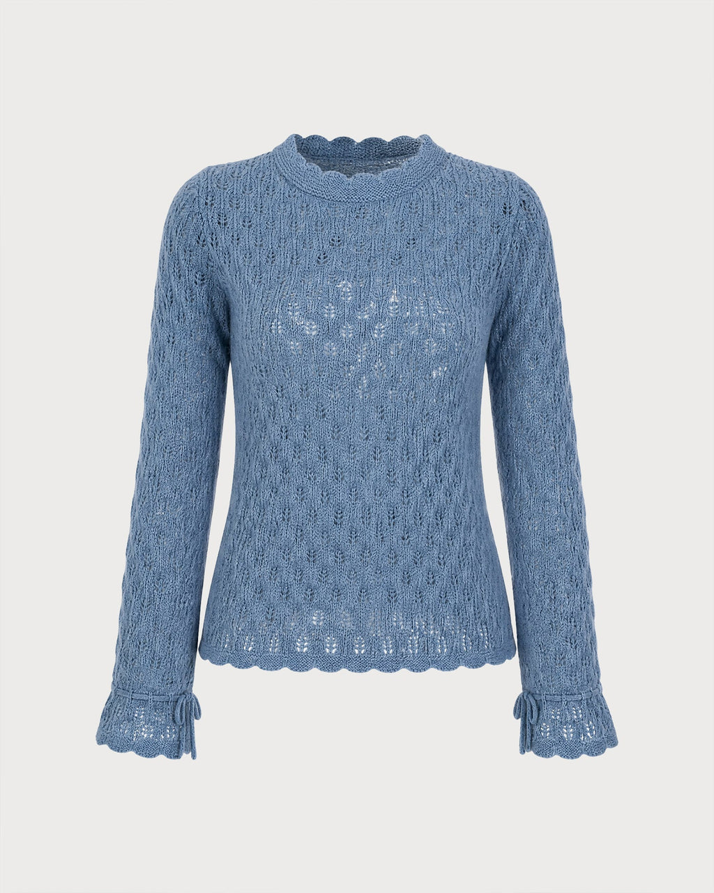 Suéter azul texturizado con volantes y elegantes mangas acampanadas