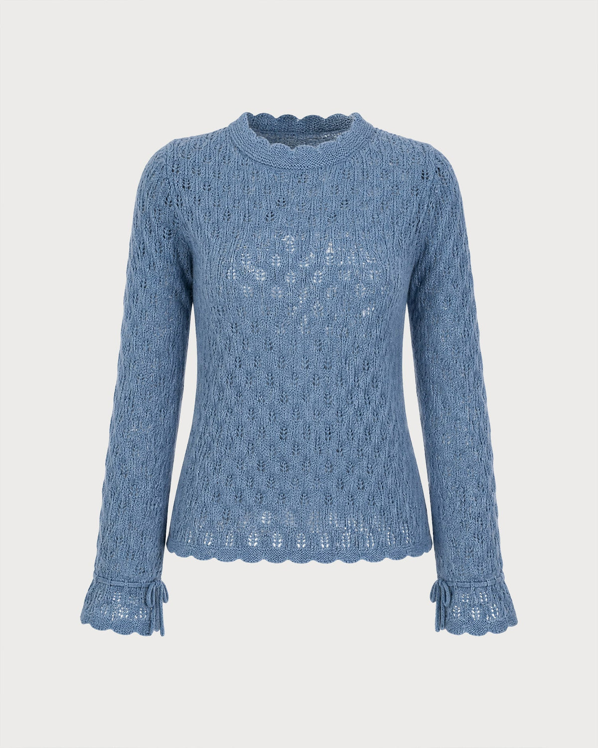 Suéter azul texturizado con volantes y elegantes mangas acampanadas