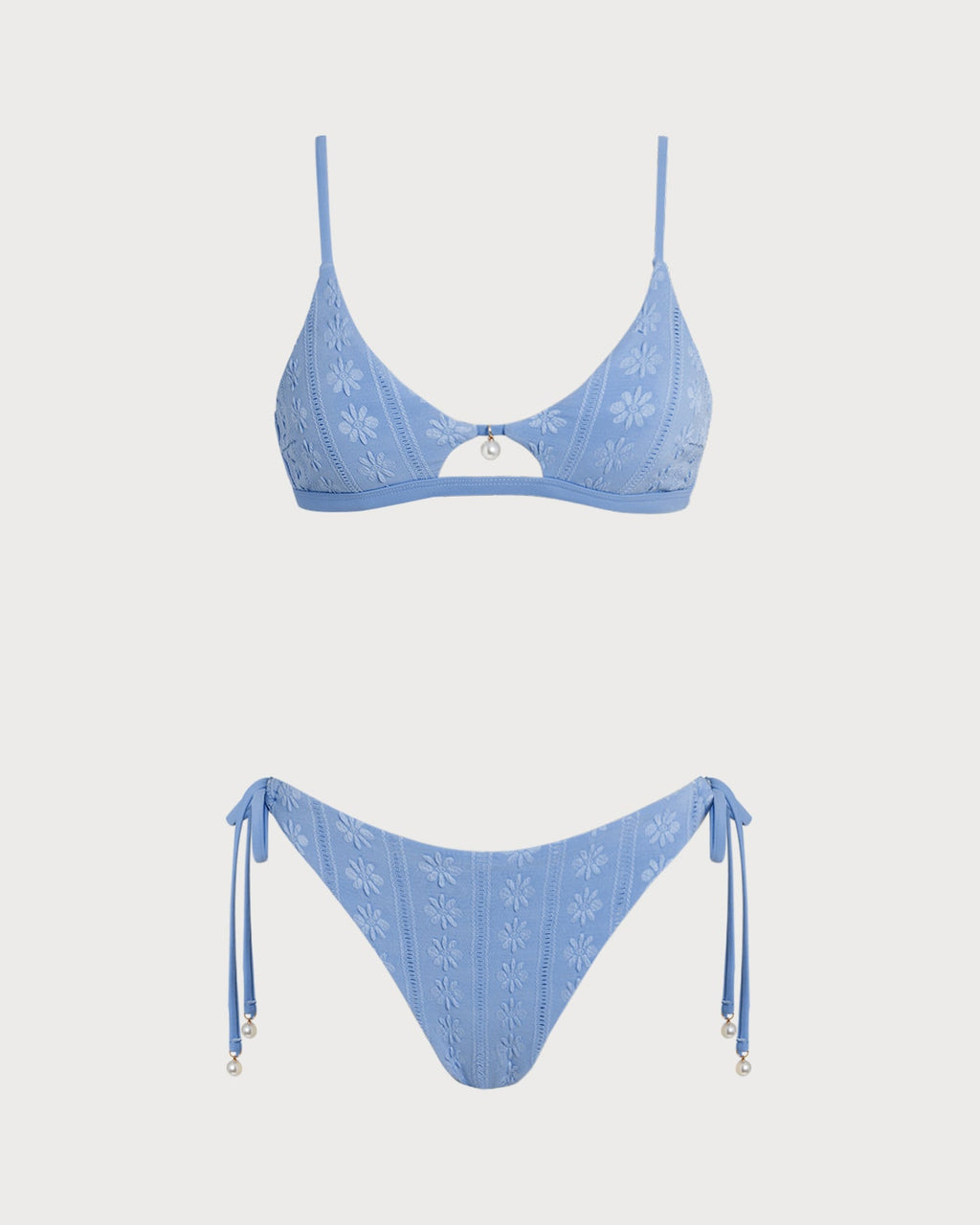 Conjunto de bikini triangular azul con estampado floral y escote en U