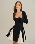 Vestido mini negro con mangas acampanadas en contraste