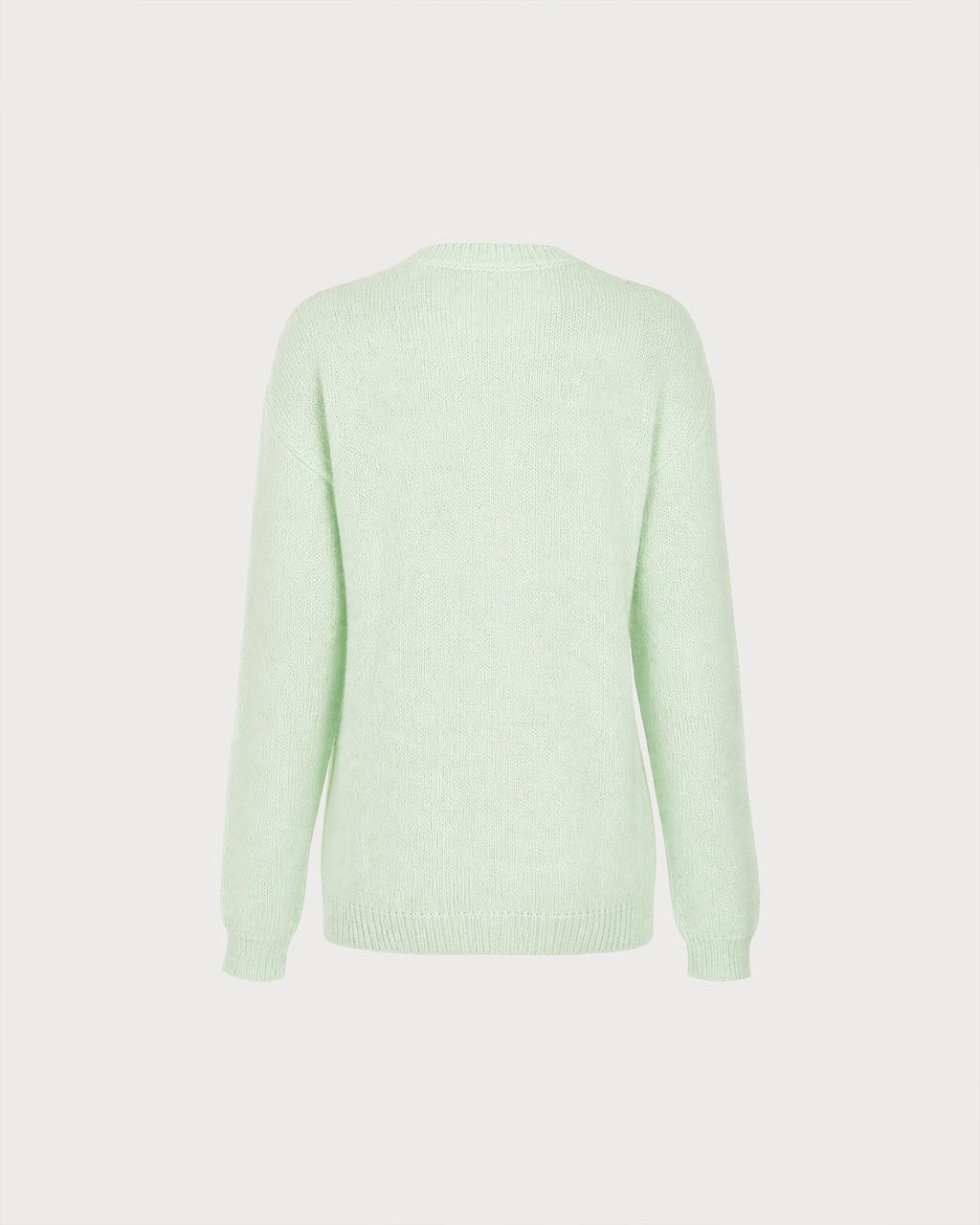 Suéter de punto verde texturizado con cuello redondo