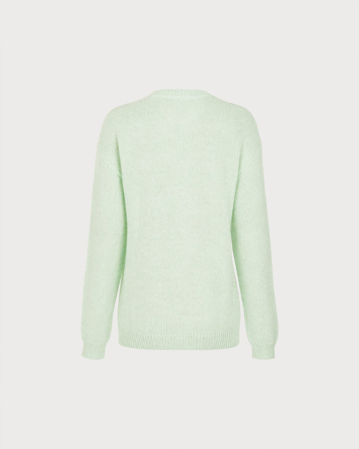 Suéter de punto verde texturizado con cuello redondo