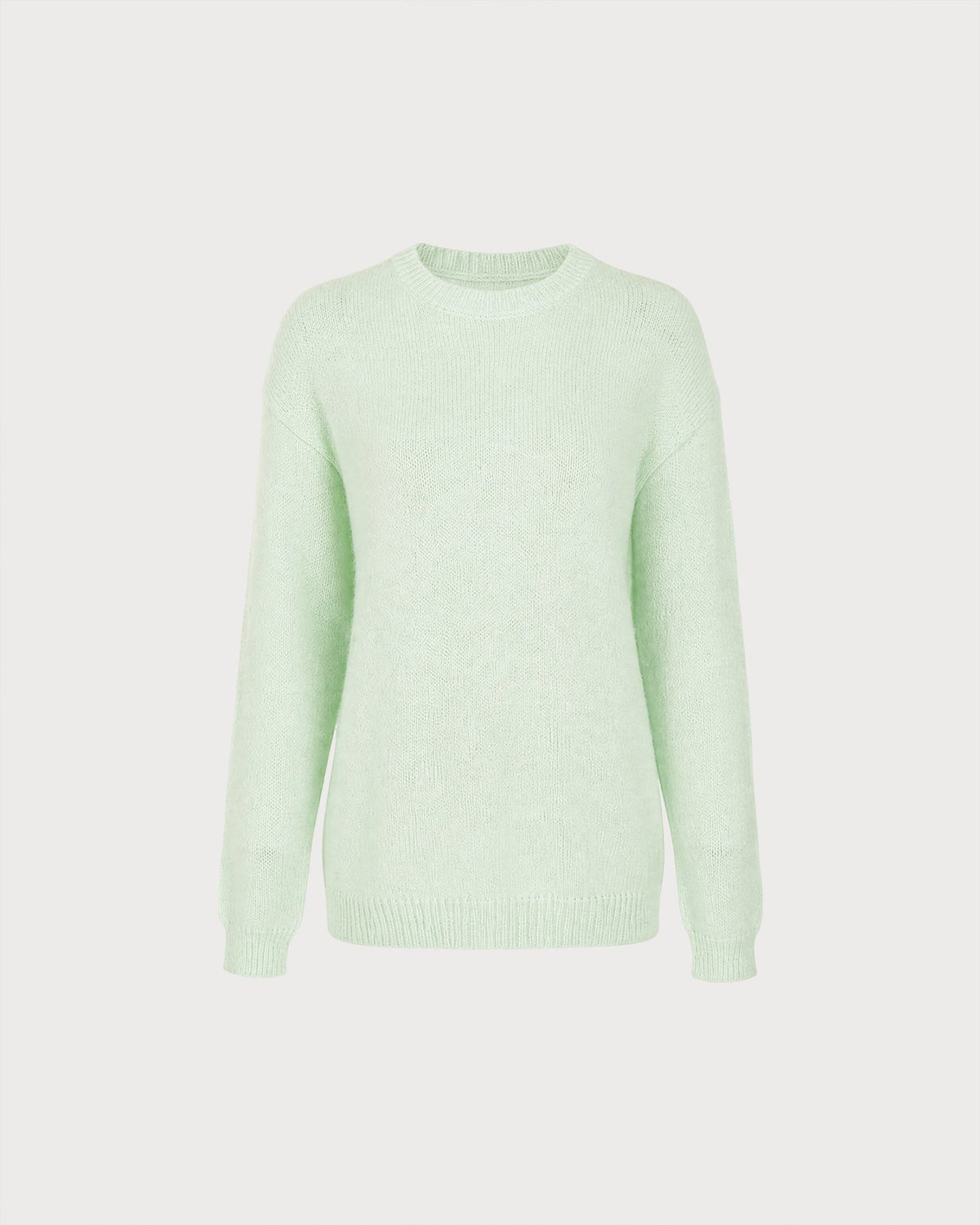 Suéter de punto verde texturizado con cuello redondo