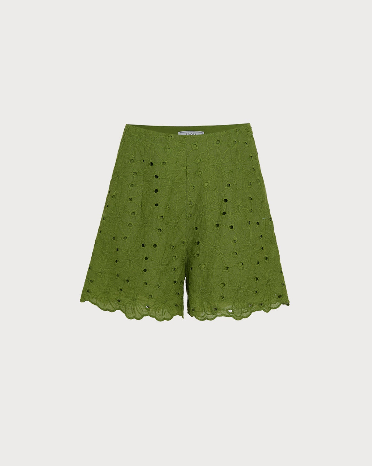 Shorts verdes bordados con bolsillos con recortes