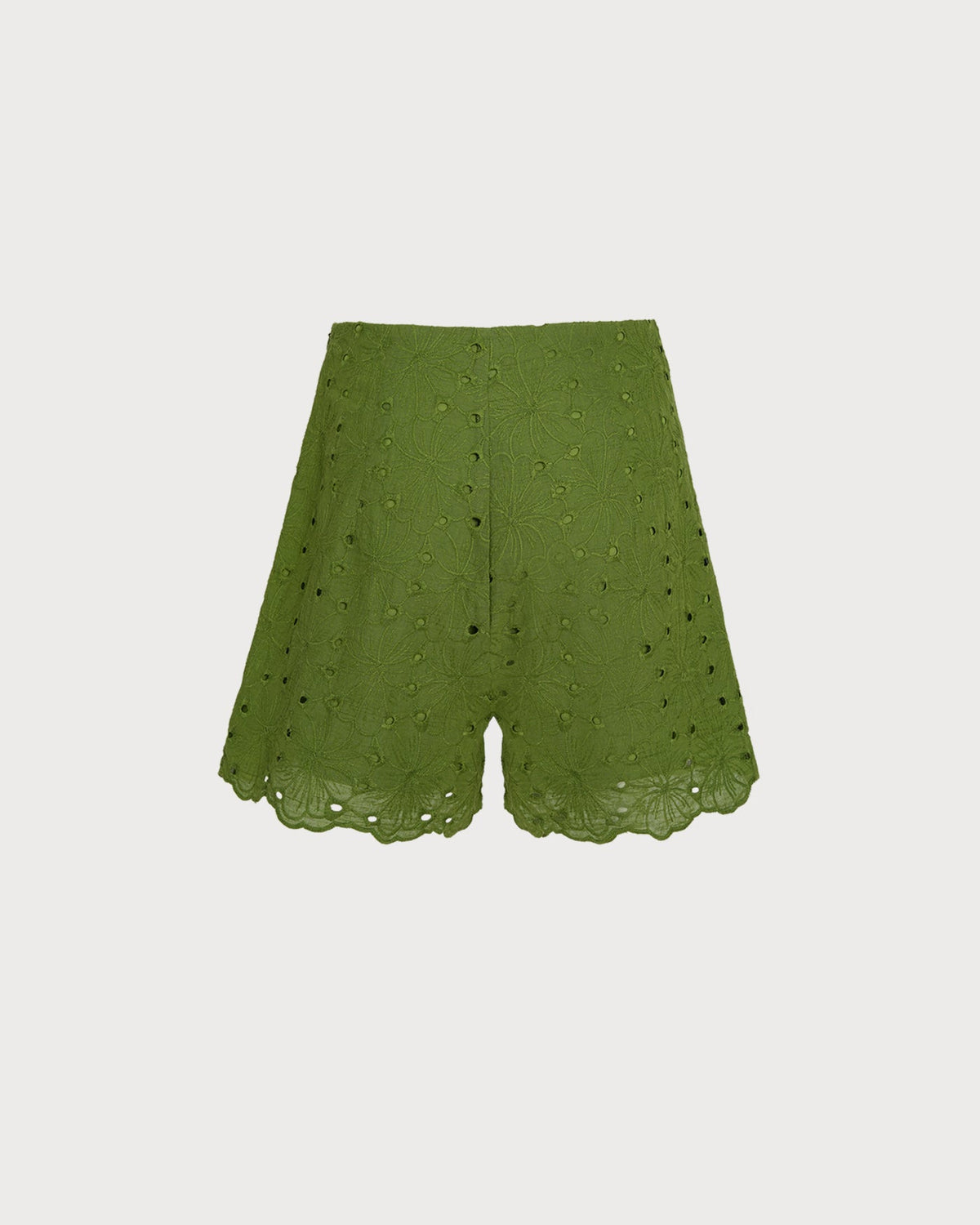 Shorts verdes bordados con bolsillos con recortes