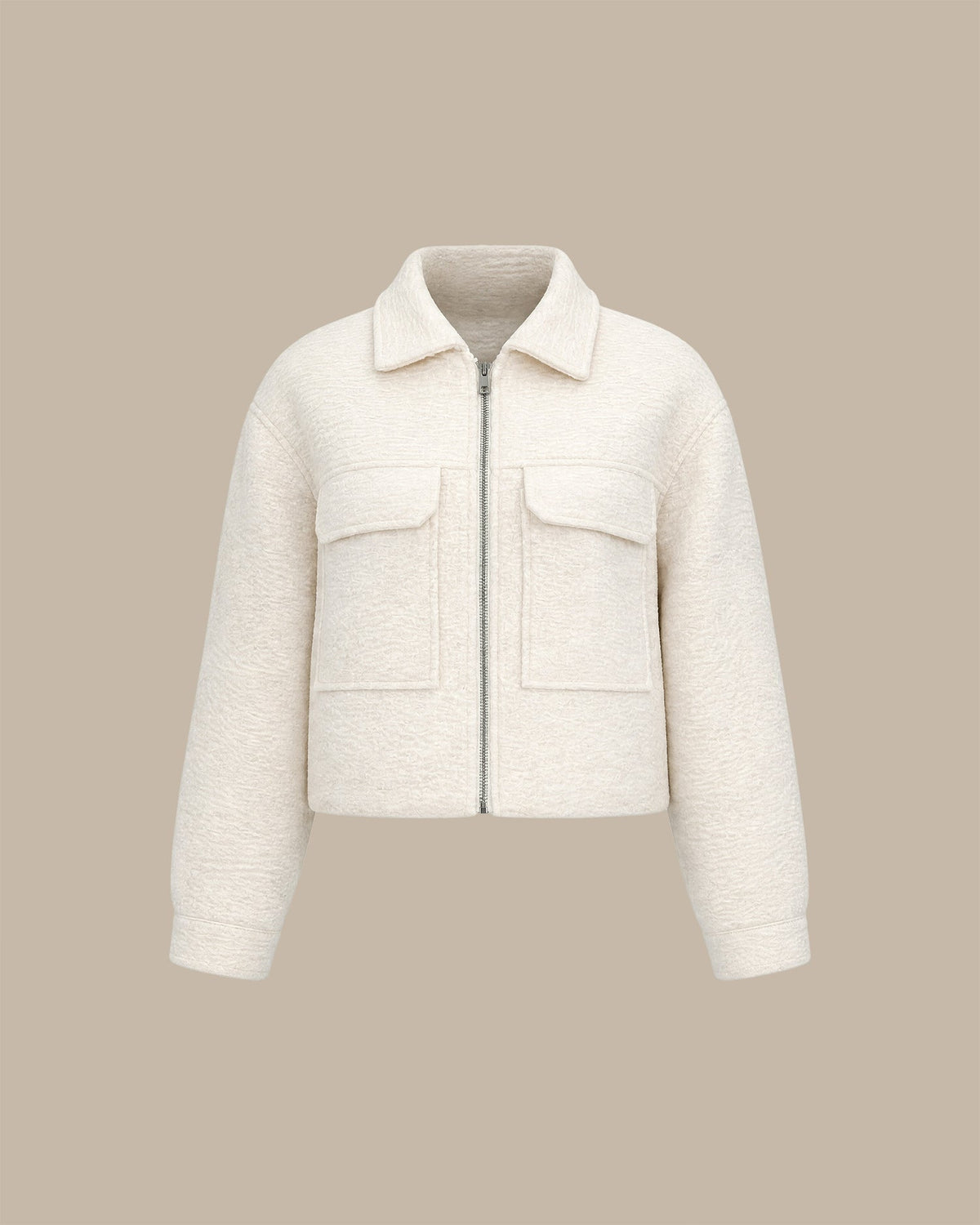 Chaqueta lisa en blanco roto con elegantes bolsillos de cremallera