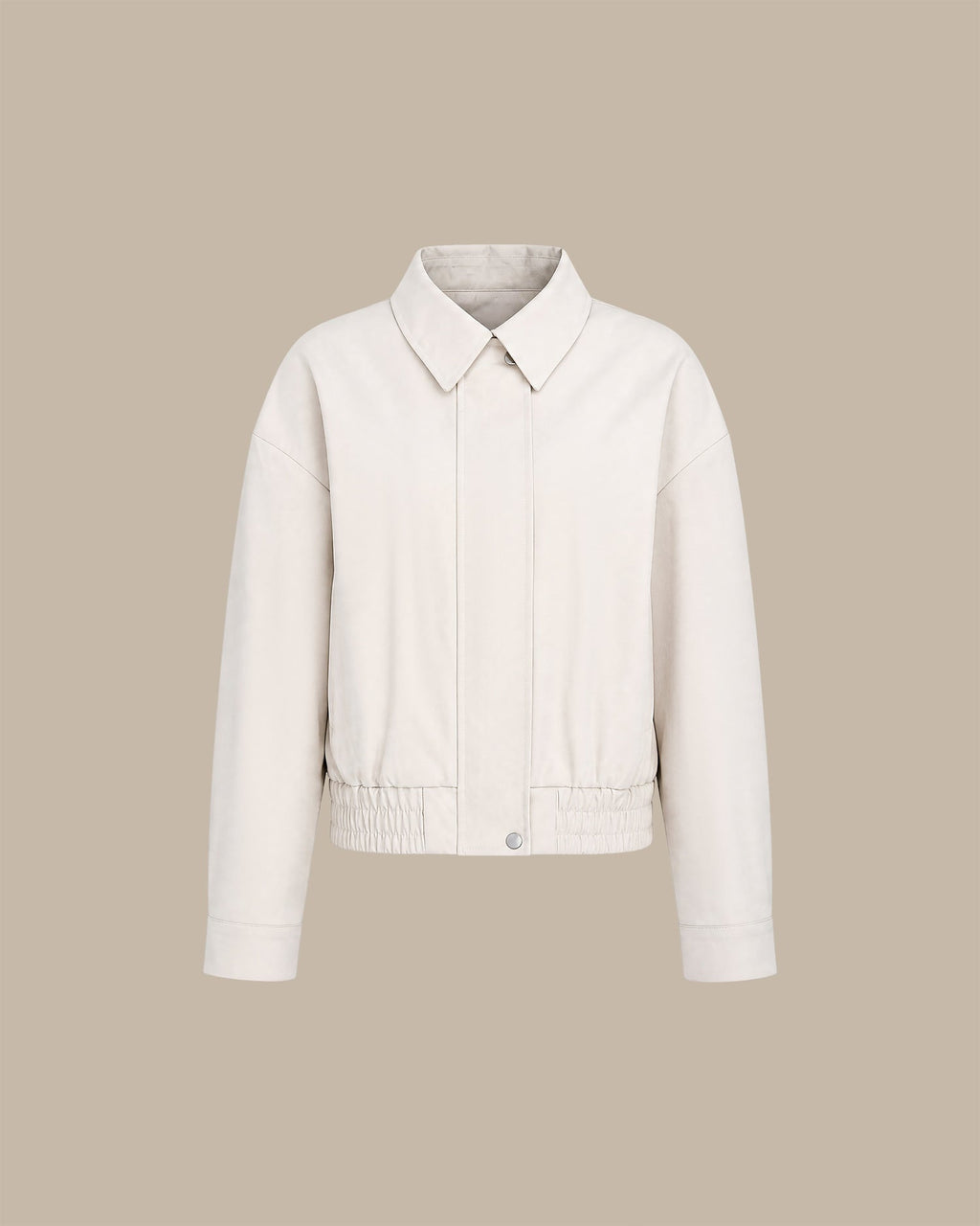 Chaqueta elegante de color blanco roto con bolsillos con cremallera