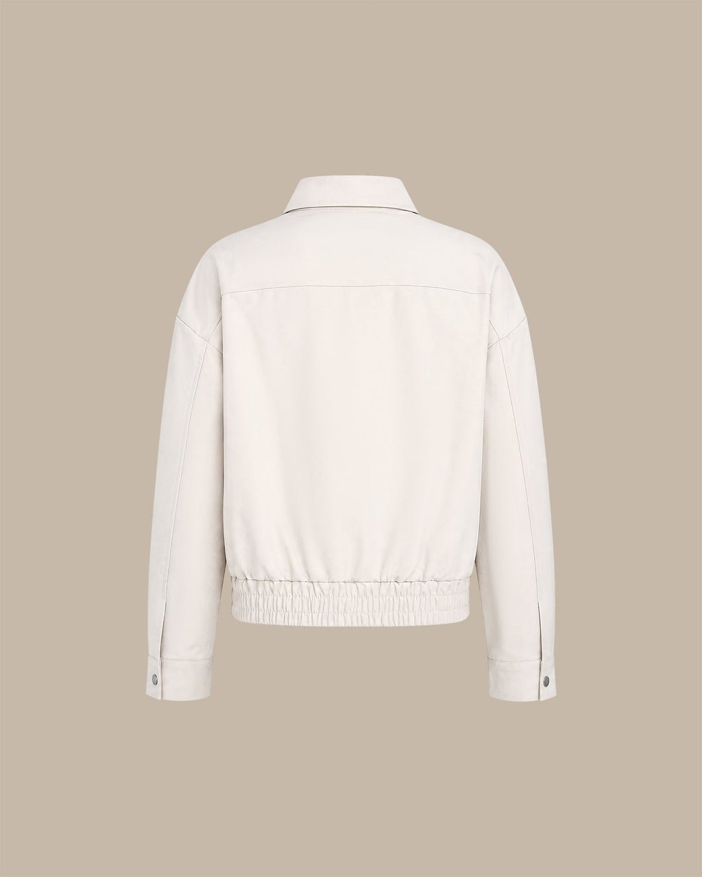 Chaqueta elegante de color blanco roto con bolsillos con cremallera