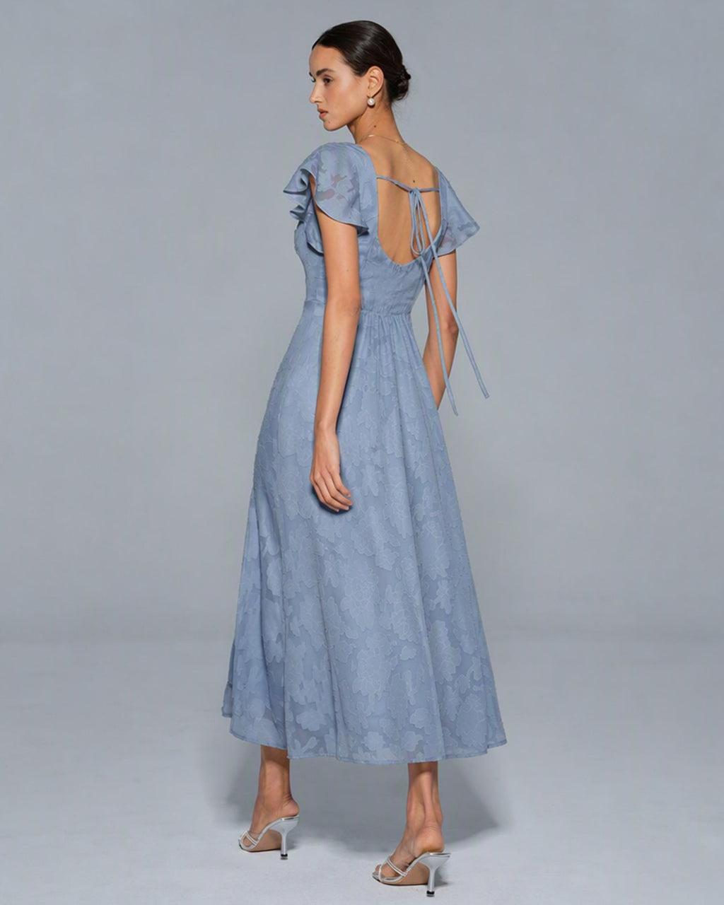 Vestido elegante azul con estampado floral