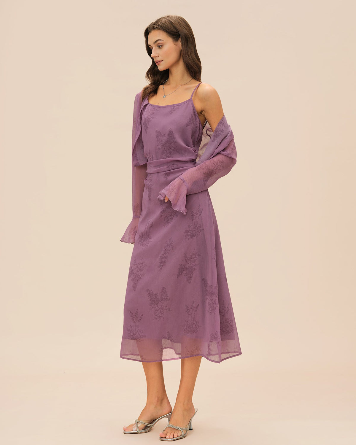 Vestido elegante morado con estampado floral