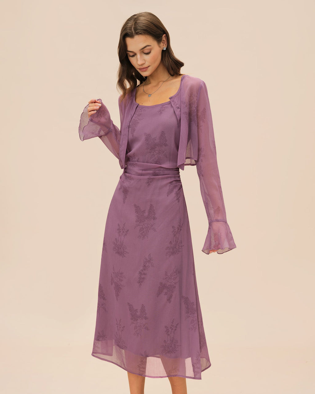 Vestido elegante morado con estampado floral