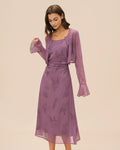 Vestido elegante morado con estampado floral