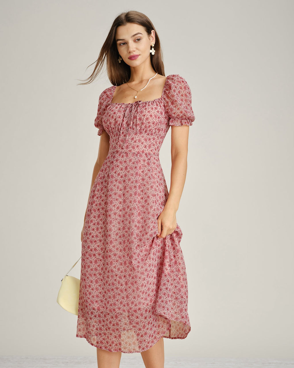 Vestido elegante floral de gasa rosa con escote