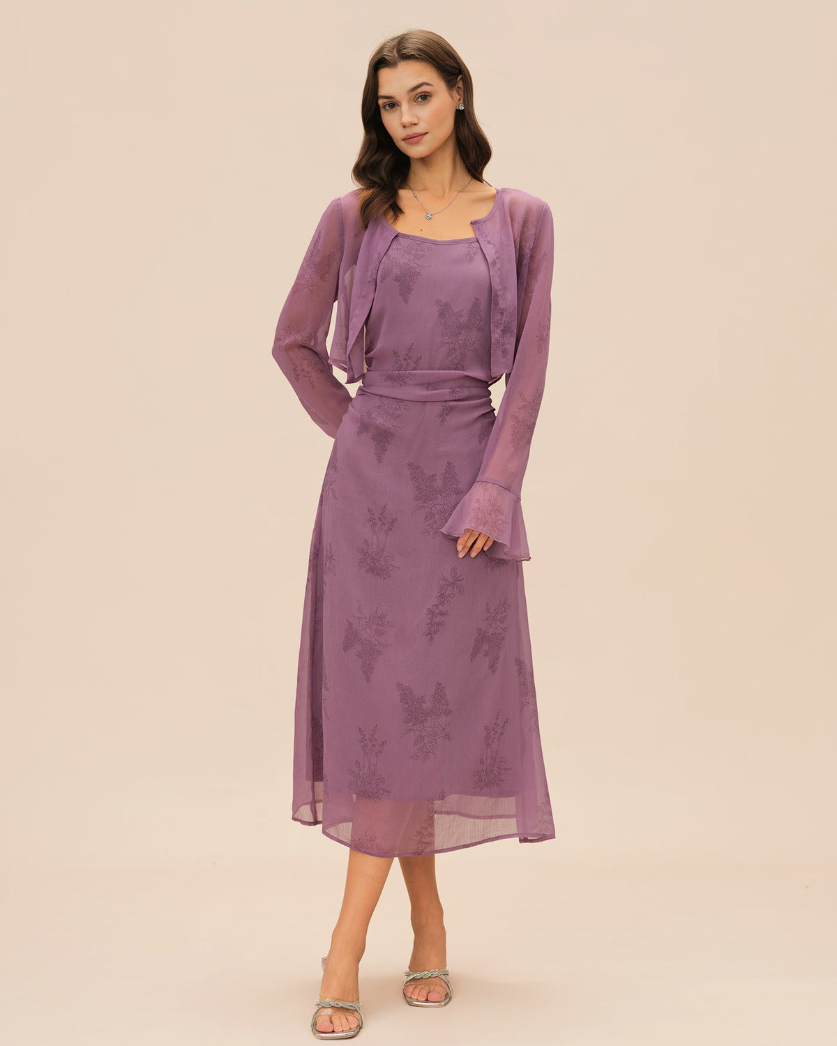 Vestido elegante morado con estampado floral