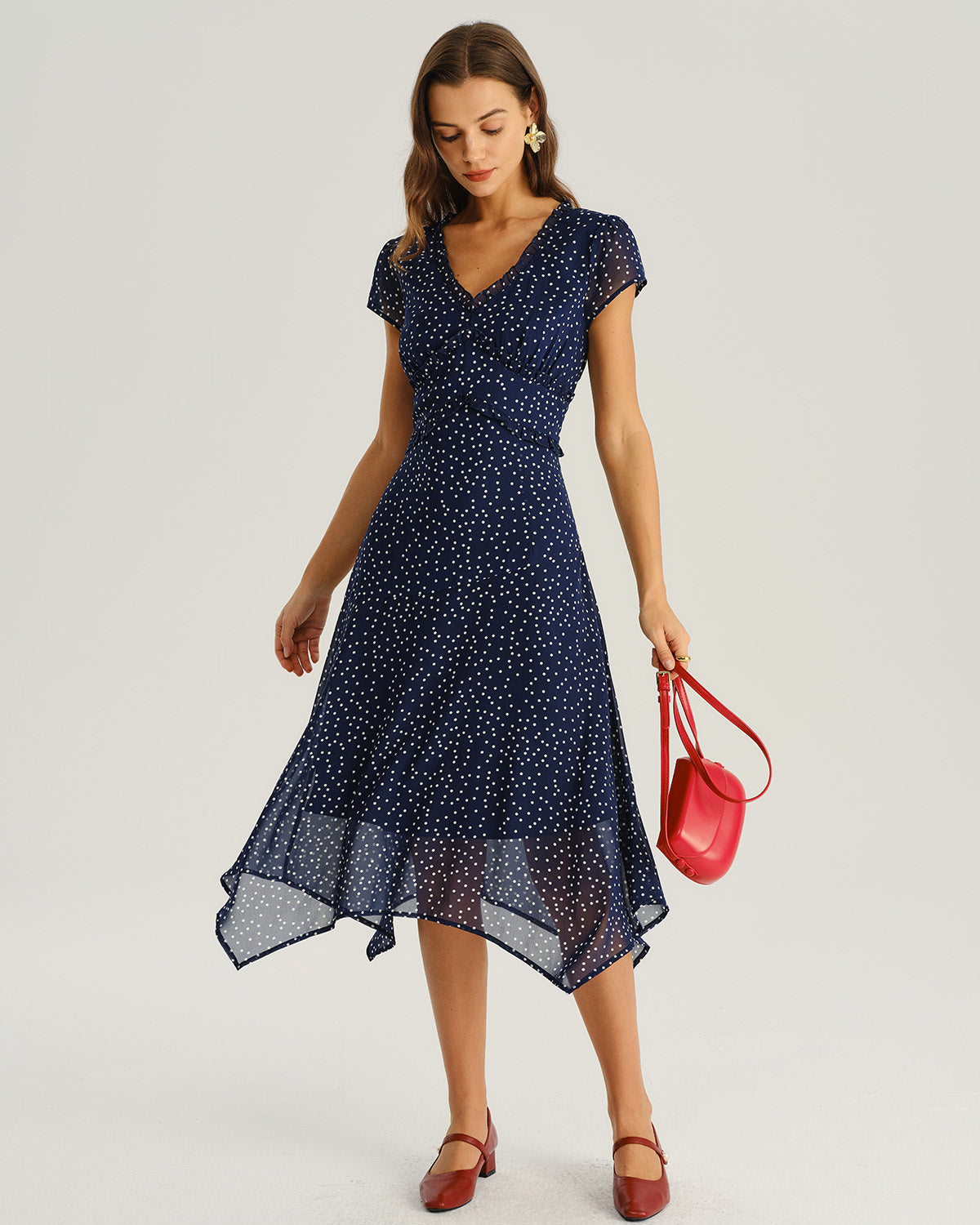 Vestido elegante azul marino con lunares
