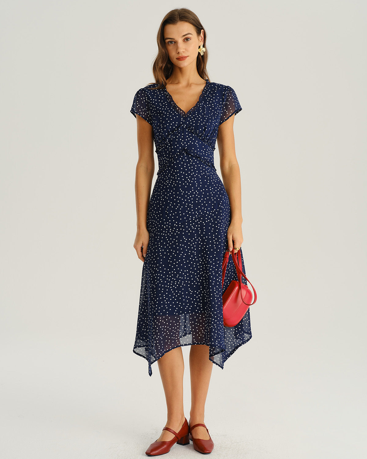 Vestido elegante azul marino con lunares